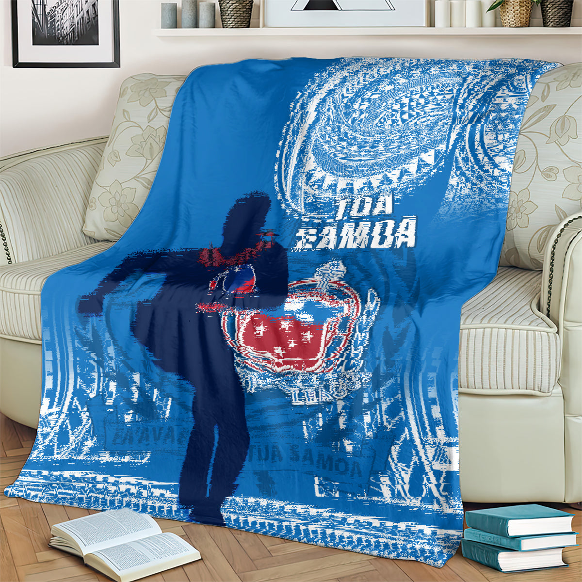 Blue rugby blanket with large Polynesian swirl design and Tofa Samoa emblem
