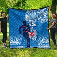 Blue quilted Samoa rugby throw with player figure and circular emblem print
