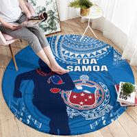 Blue round rugby carpet with Toa Samoa text and rugby player graphic in foreground