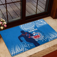 Blue rugby doormat with Toa Samoa text, shield crest, and white patterned border