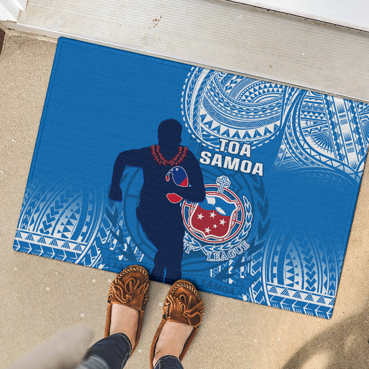 Blue rubber doormat with rugby player silhouette, crest, and TOA SAMOA text