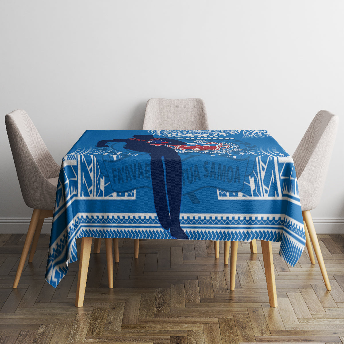 Blue rugby tablecloth with white patterned panels, centered on a dining table