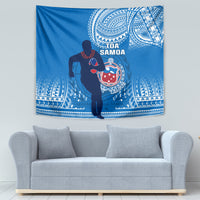 Blue rugby tapestry showing Toa Samoa warrior holding a ball with white emblem
