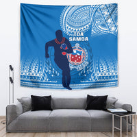 Blue rugby tapestry with Toa Samoa warrior figure and bold white decorative patterns