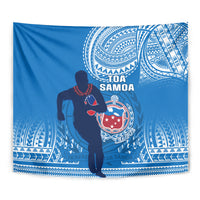 Blue rugby tapestry close-up with TOA SAMOA text, warrior and circular emblem