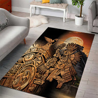 Aztec area rug featuring hummingbird, sun, and geometric motifs in gold on black