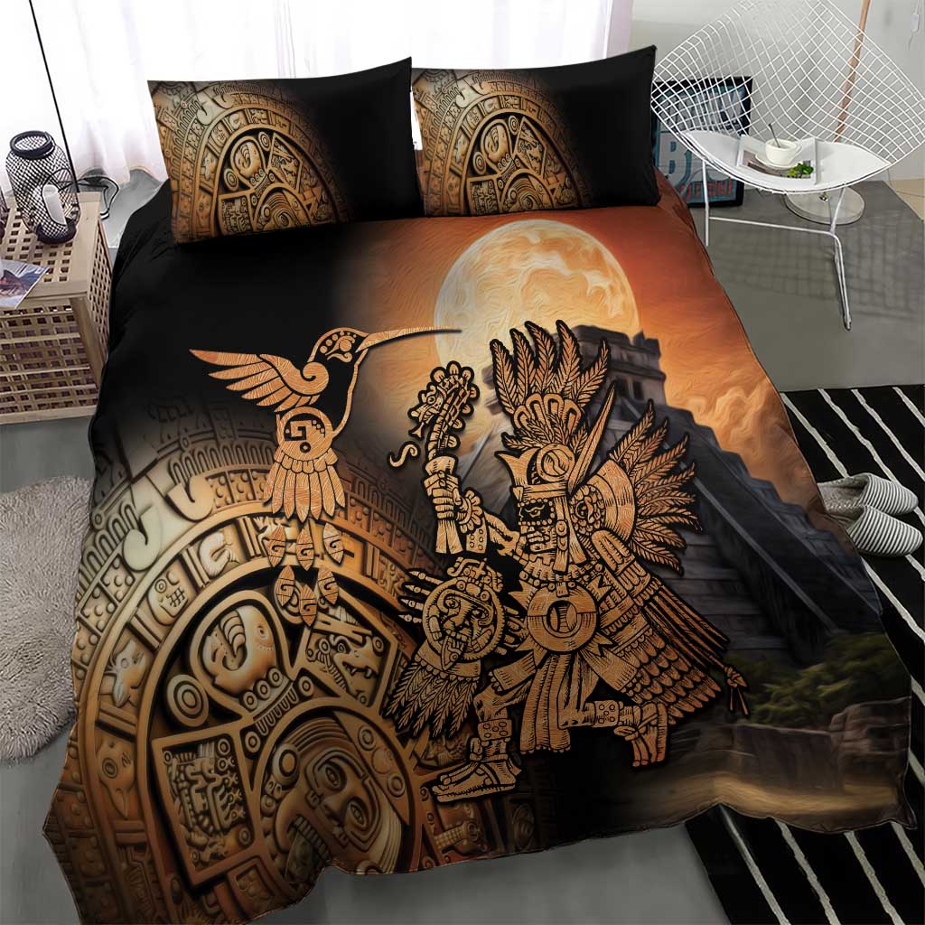 Black duvet cover with Aztec warrior and hummingbird print, gold and tan detailing