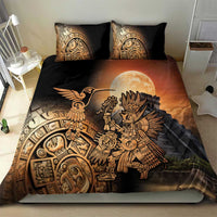 Black bedding set with large Aztec warrior figure and hummingbird graphic in gold