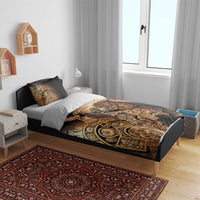 Black duvet cover with Aztec warrior and hummingbird print in gold and tan tones