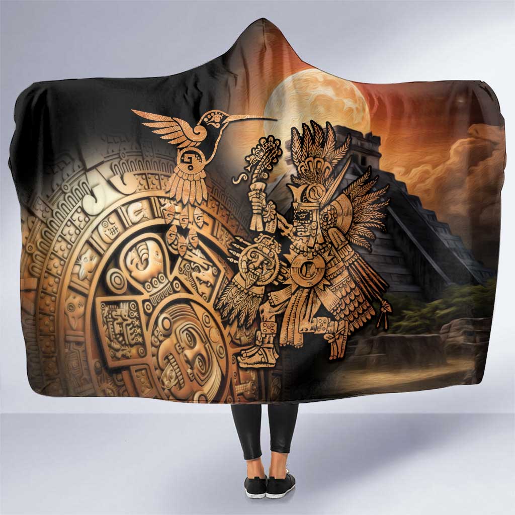 Black hooded blanket with Aztec warrior and hummingbird print, draped front view