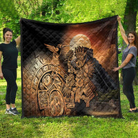 Large black quilted blanket with Aztec hummingbird warrior figure and golden artwork print