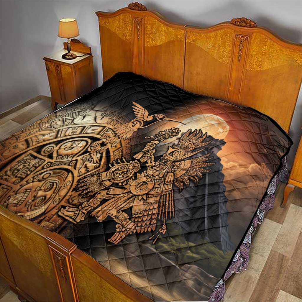 Black quilted bedspread with Aztec warrior feathered bird print in golden and tan tones
