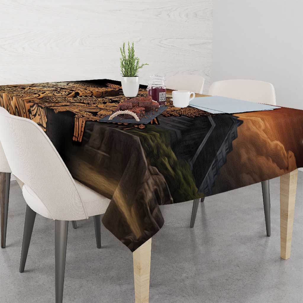 Aztec warrior tablecloth with black base and golden Aztec bird-and-warrior pattern