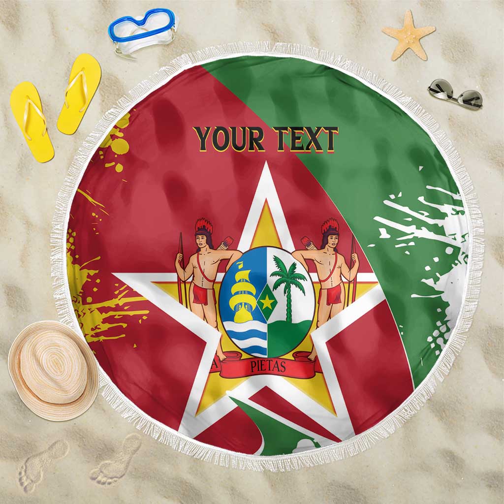 Round beach blanket with green and red Suriname flag design and white fringe edge