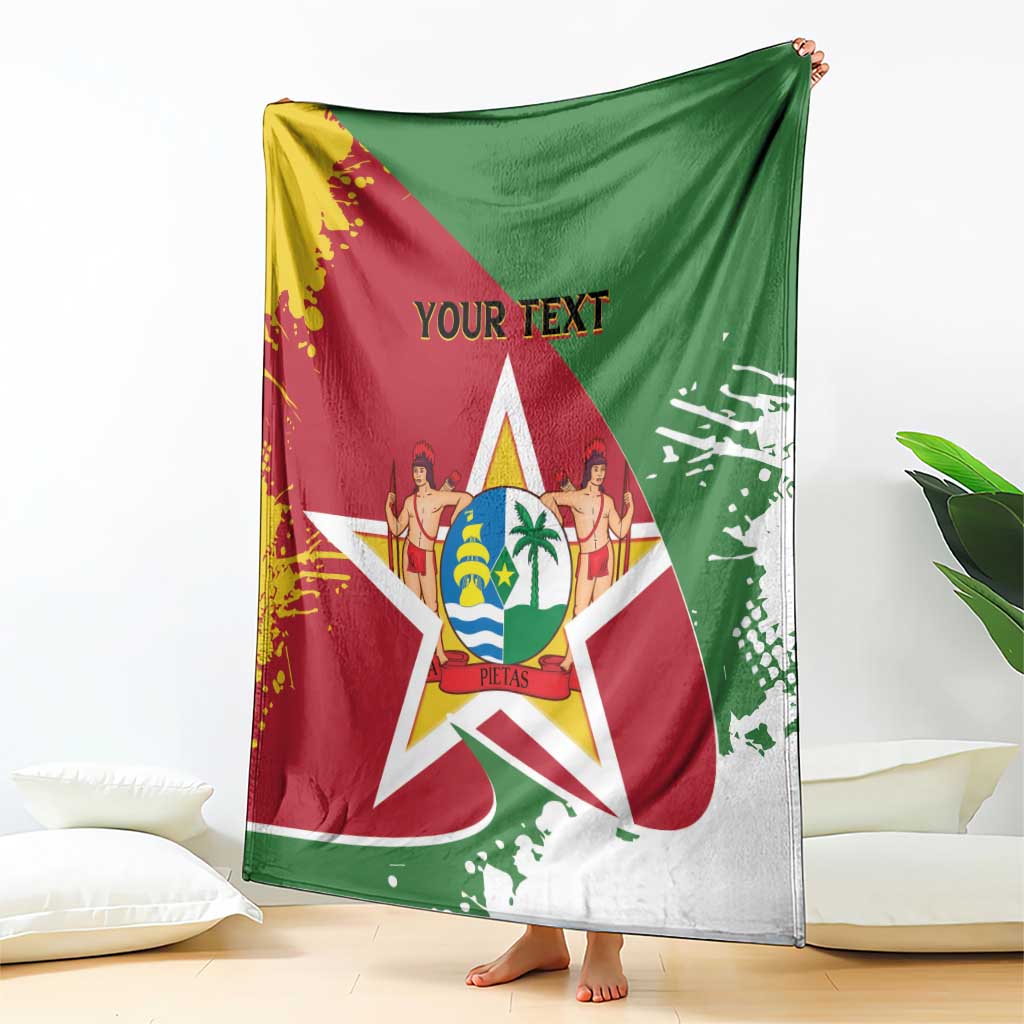 Flag-style Suriname blanket coat with crest star and "YOUR TEXT", hanging over couch