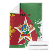 Suriname flag blanket coat with coat-of-arms star, green and red panels, folded with white blankets