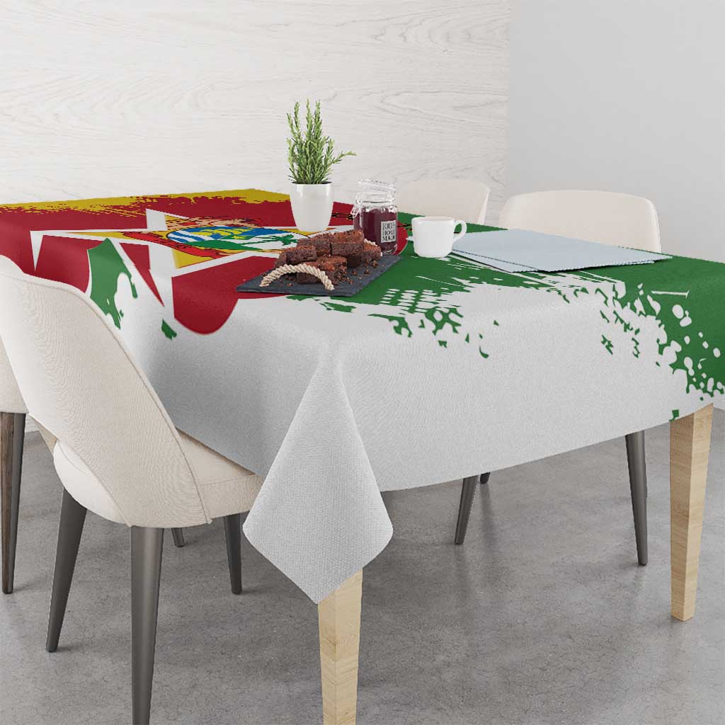 Suriname flag-style tablecloth on dining table with spread corners, red green white design
