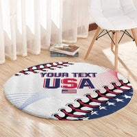 White round rug with USA lettering, stars, and red-blue baseball glove graphic on floor