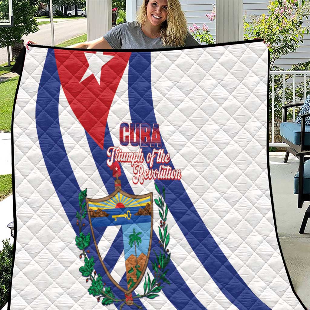 White Cuba-themed quilt blanket with red and blue diagonal flag stripes and crest