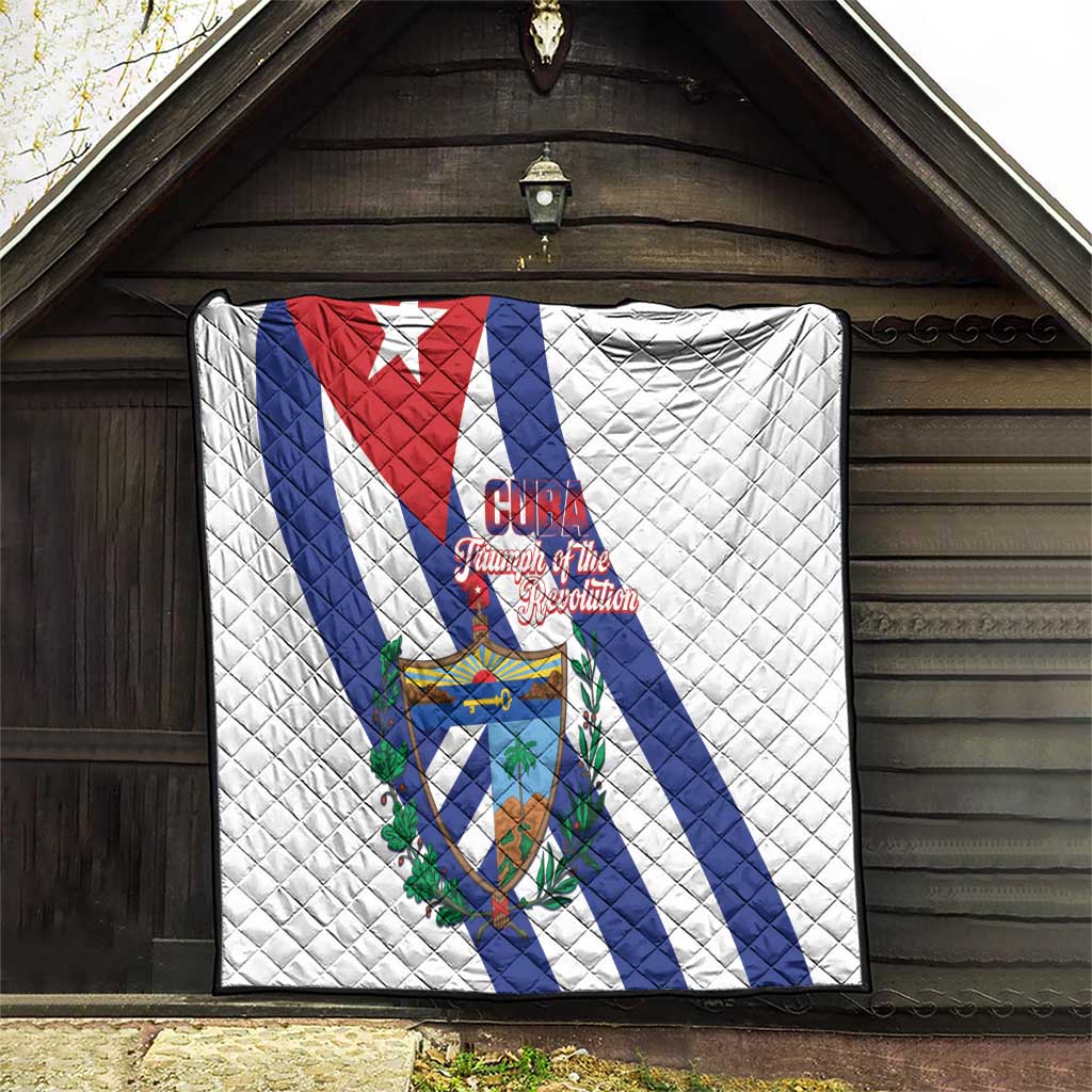 White quilt blanket showing Cuba flag diagonal stripes, central shield crest, red lettering