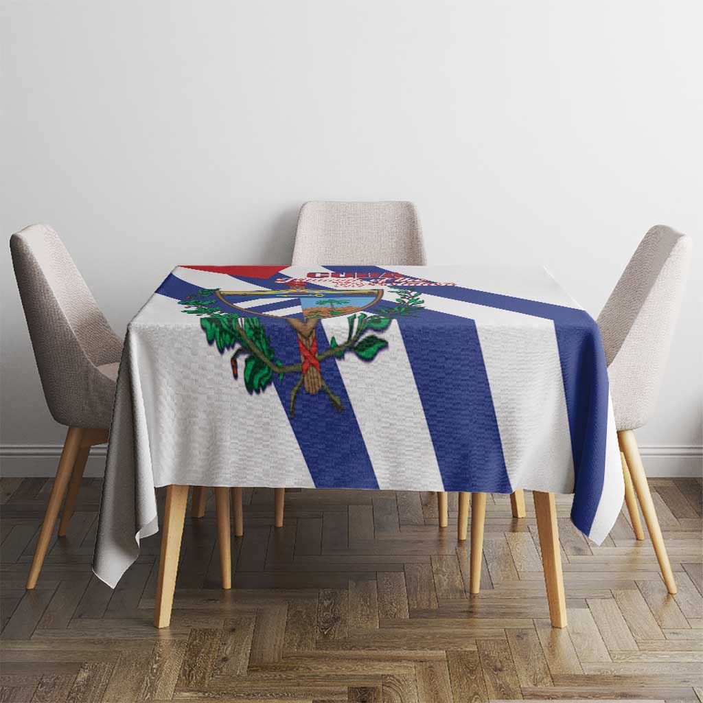 White tablecloth with blue-and-white stripes and Cuban emblem, on dining table