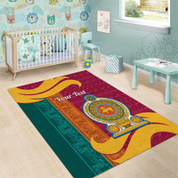 Maroon, teal, and gold lion emblem area rug featuring “Your Text” and ornate stripes