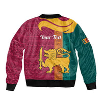 Back of multicolor bomber jacket with lion holding sword graphic, maroon teal panels, black cuffs