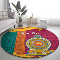 Round decorative rug with lion medallion, maroon center and teal/orange bands