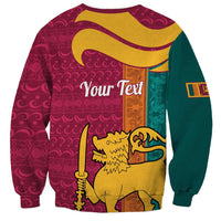 Maroon crewneck sweatshirt with Your Text and lion graphic over patterned background