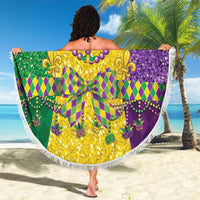 Round Mardi Gras blanket with central gold and purple fleur-de-lis motif and white fringe