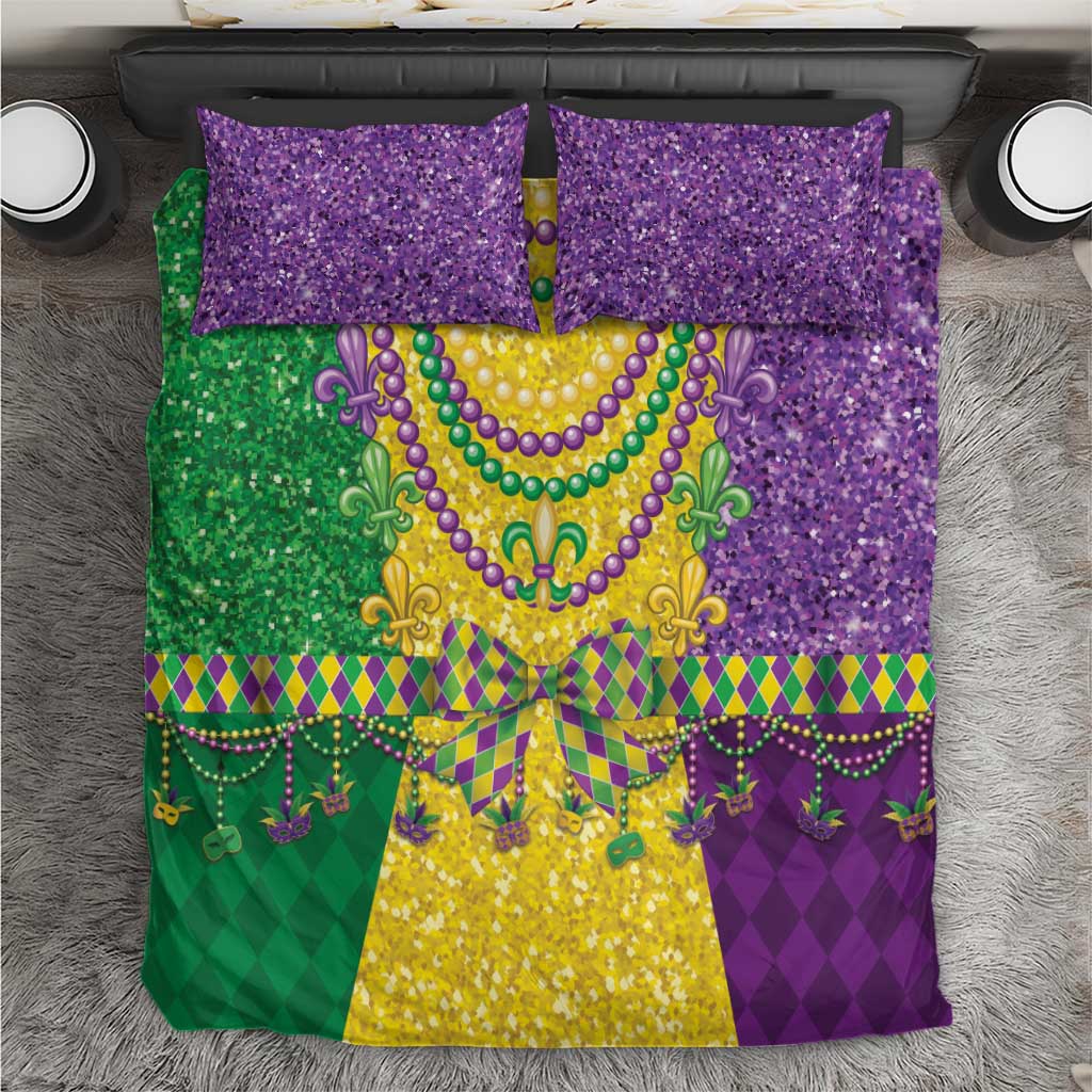 Mardi Gras bedding set with purple glitter pillows and a green, yellow, purple fleur-de-lis design