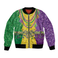 Unisex glitter bomber jacket with purple-green design, zip front, fleur-de-lis beaded necklace