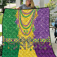 Mardi Gras fleur-de-lis quilt with beaded trim, green yellow and purple patchwork