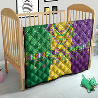 Mardi Gras fleur-de-lis quilt on crib, green yellow and purple beaded necklace pattern