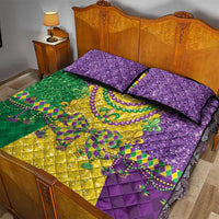 Quilt bed set with fleur-de-lis beaded oval, purple quilt with black trim, two pillows