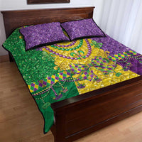Quilt bed set with green, purple, and gold patchwork, fleur-de-lis oval, two pillows
