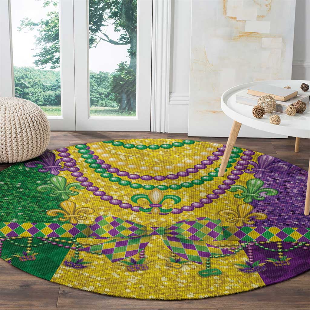 Round Mardi Gras patterned rug with purple edge, green sections, and gold fleur-de-lis