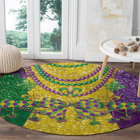 Round Mardi Gras patterned rug with purple edge, green sections, and gold fleur-de-lis