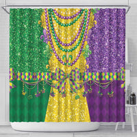 Mardi Gras shower curtain with jeweled green and purple necklace, fleur-de-lis trim