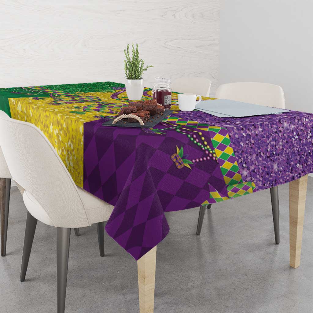 Mardi Gras tablecloth with checker and fleur-de-lis designs in purple, green, and gold