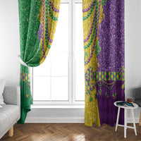Mardi Gras curtain panels hanging beside a doorframe, green and purple with gold fleur-de-lis