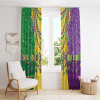 Mardi Gras curtain panels on a window, green left and purple right with beaded fleur-de-lis accents