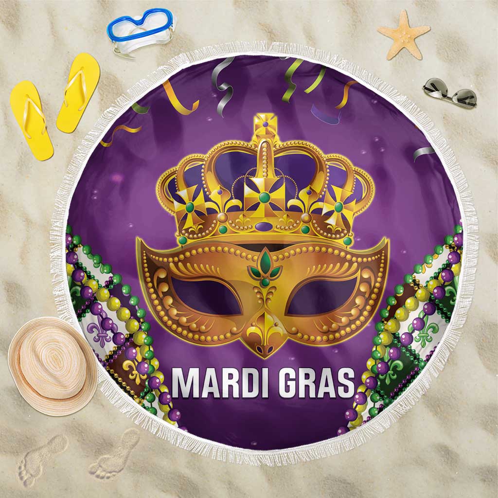 Purple Mardi Gras beach blanket with gold mask, bead accents, and white fringed edge