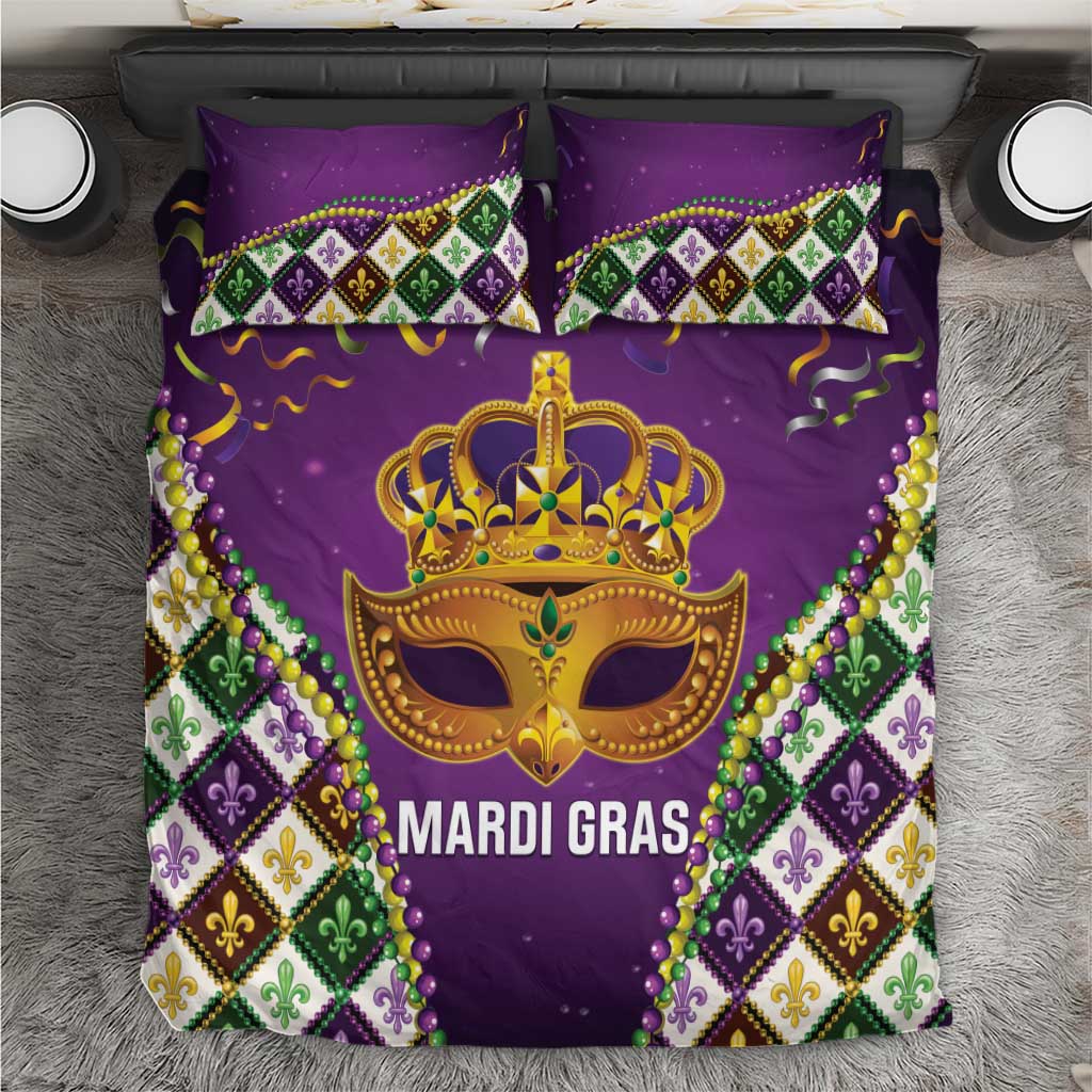 Purple Mardi Gras king bedding set with gold mask crown, bead trim, and fleur-de-lis diamonds