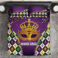 Purple Mardi Gras king bedding set with gold mask crown, bead trim, and fleur-de-lis diamonds