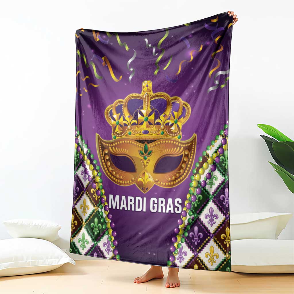 Purple Mardi Gras throw blanket featuring gold crown mask and bead trim border