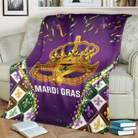 Purple Mardi Gras throw blanket with gold crown mask and bead garland along sides