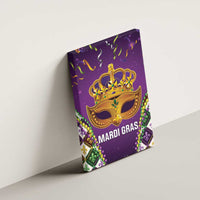 Purple Mardi Gras canvas wall art with gold masquerade mask and “MARDI GRAS” text on wall