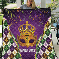 Purple quilt with gold crown mask emblem, fleur-de-lis border and beaded trim