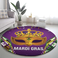 Round purple Mardi Gras carpet with fleur-de-lis crown center and beaded edge